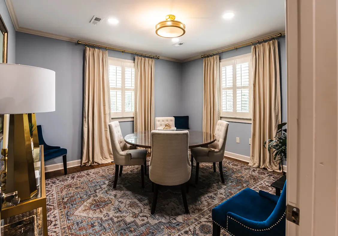 features a dining room with a round dining table